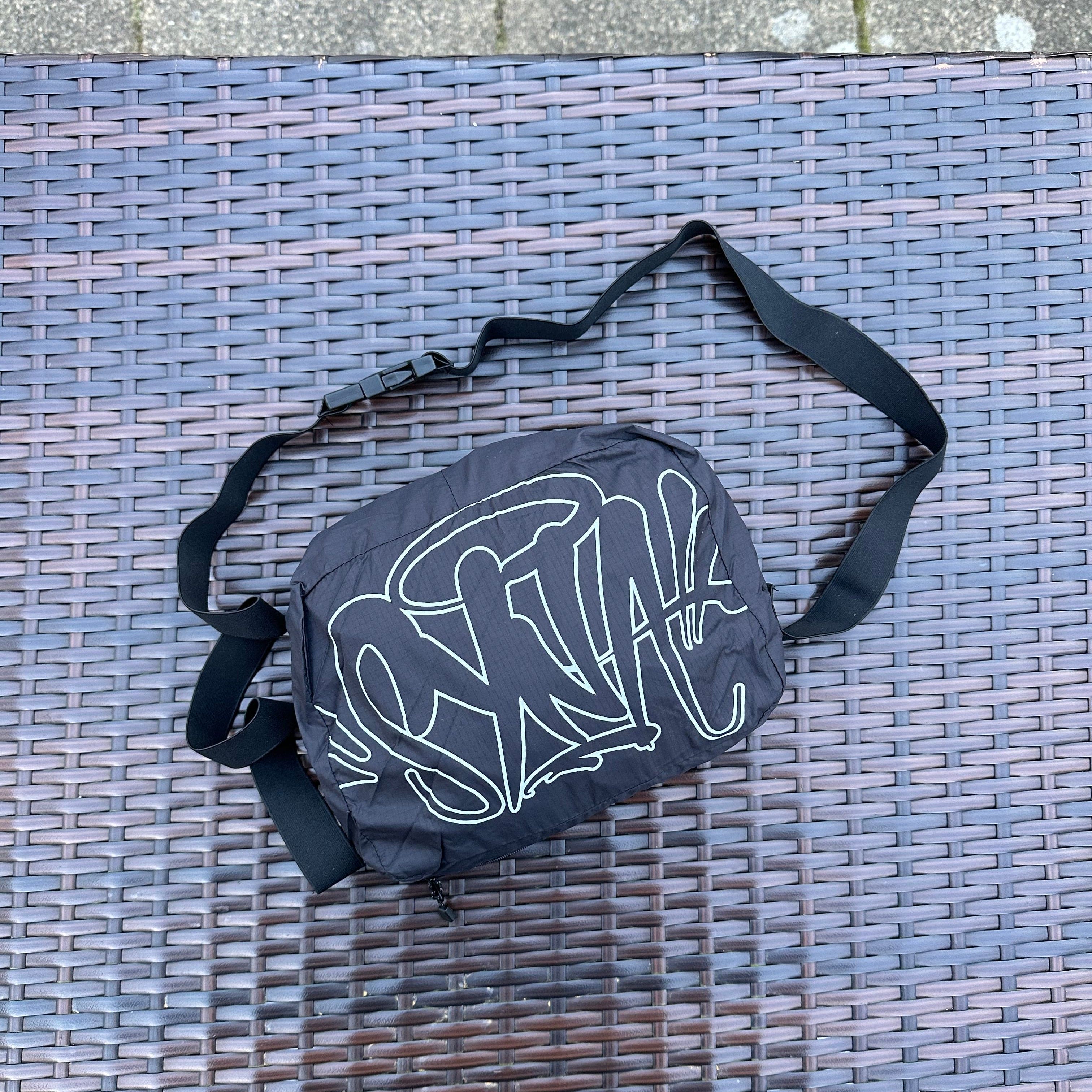 Syna World OG Logo Storm Jacket/Bag - Image 2
