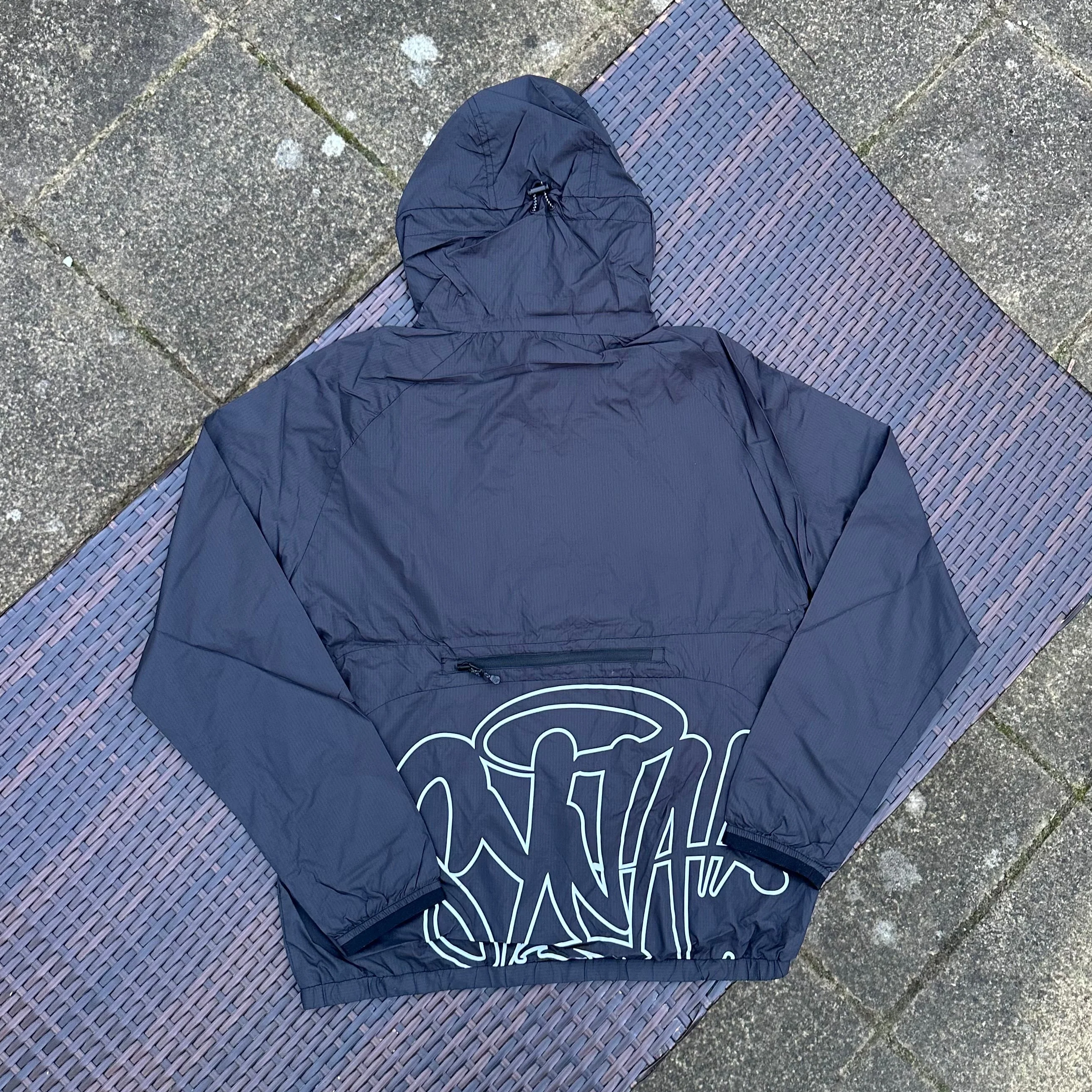 Syna World OG Logo Storm Jacket/Bag - Image 4